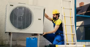 HVAC expert working on ac's outside unit